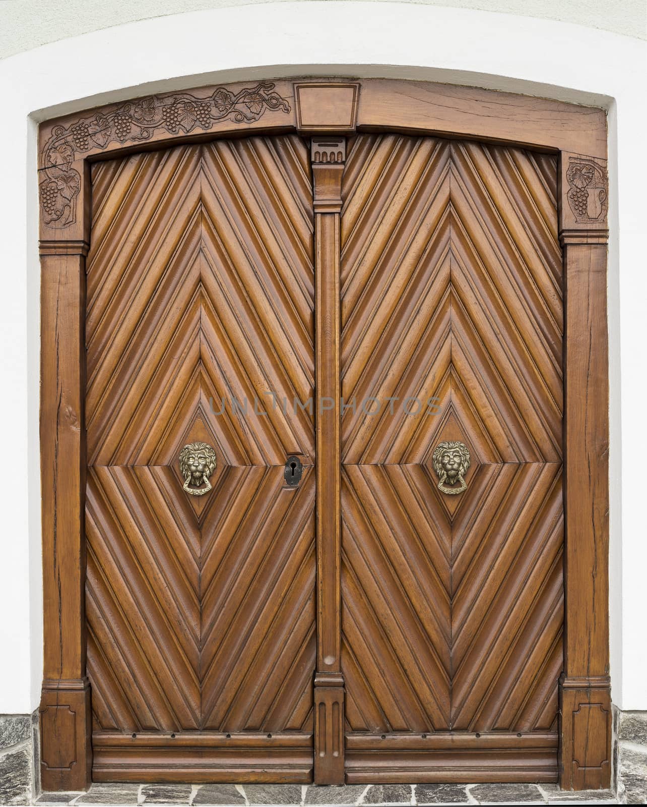 Old wooden door by photosampler