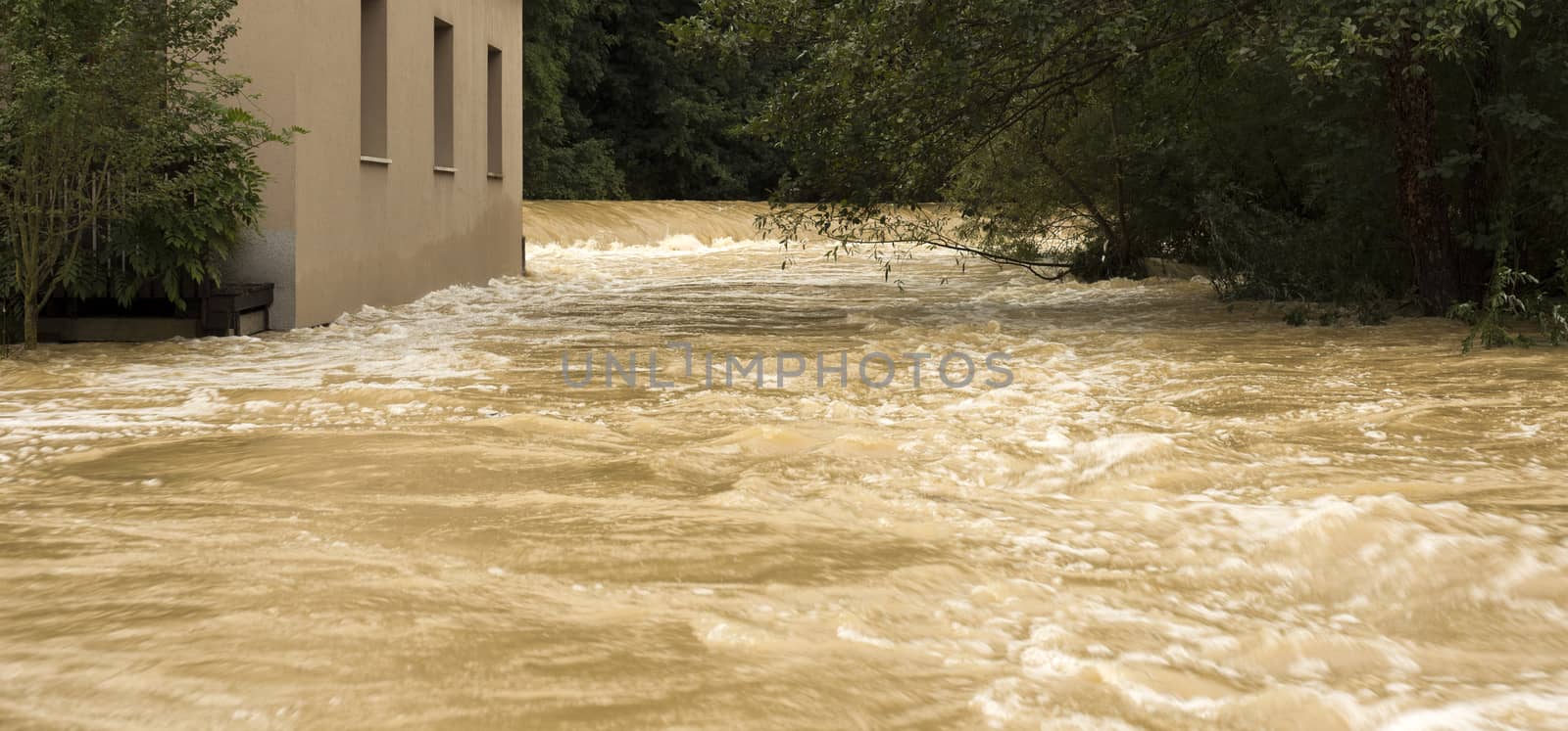 Flooding water background with blur effect, located in Slovenia.