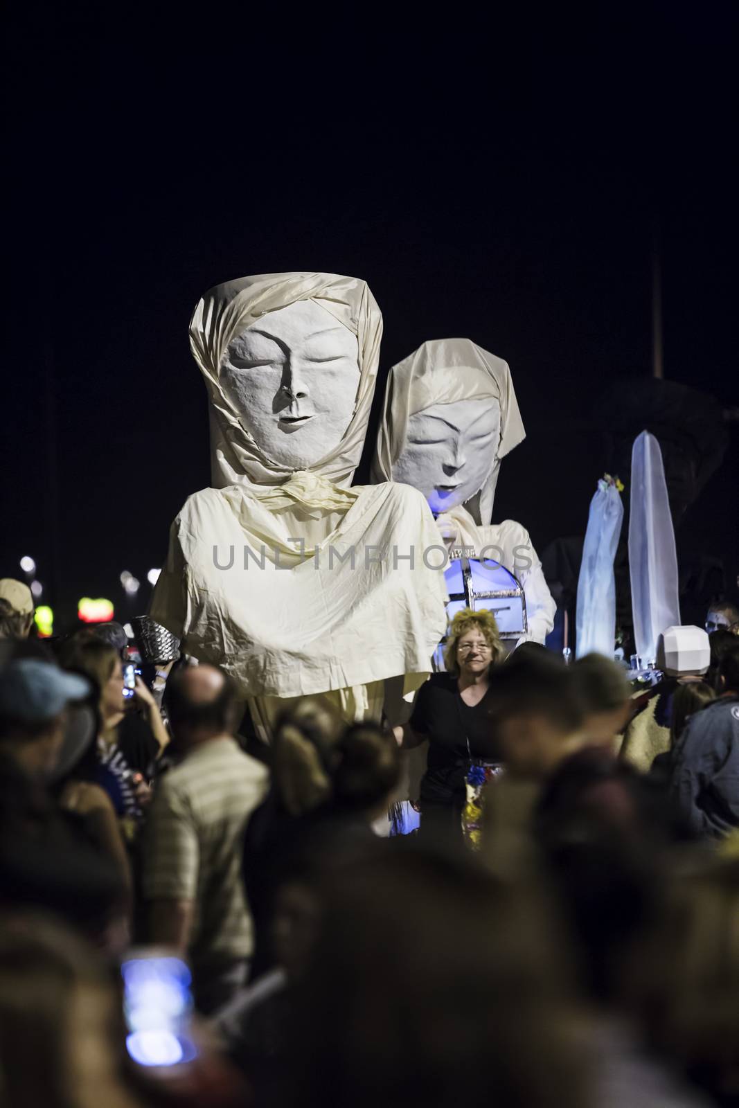 Large Faces in Dia De Los Muertos Procession by Creatista