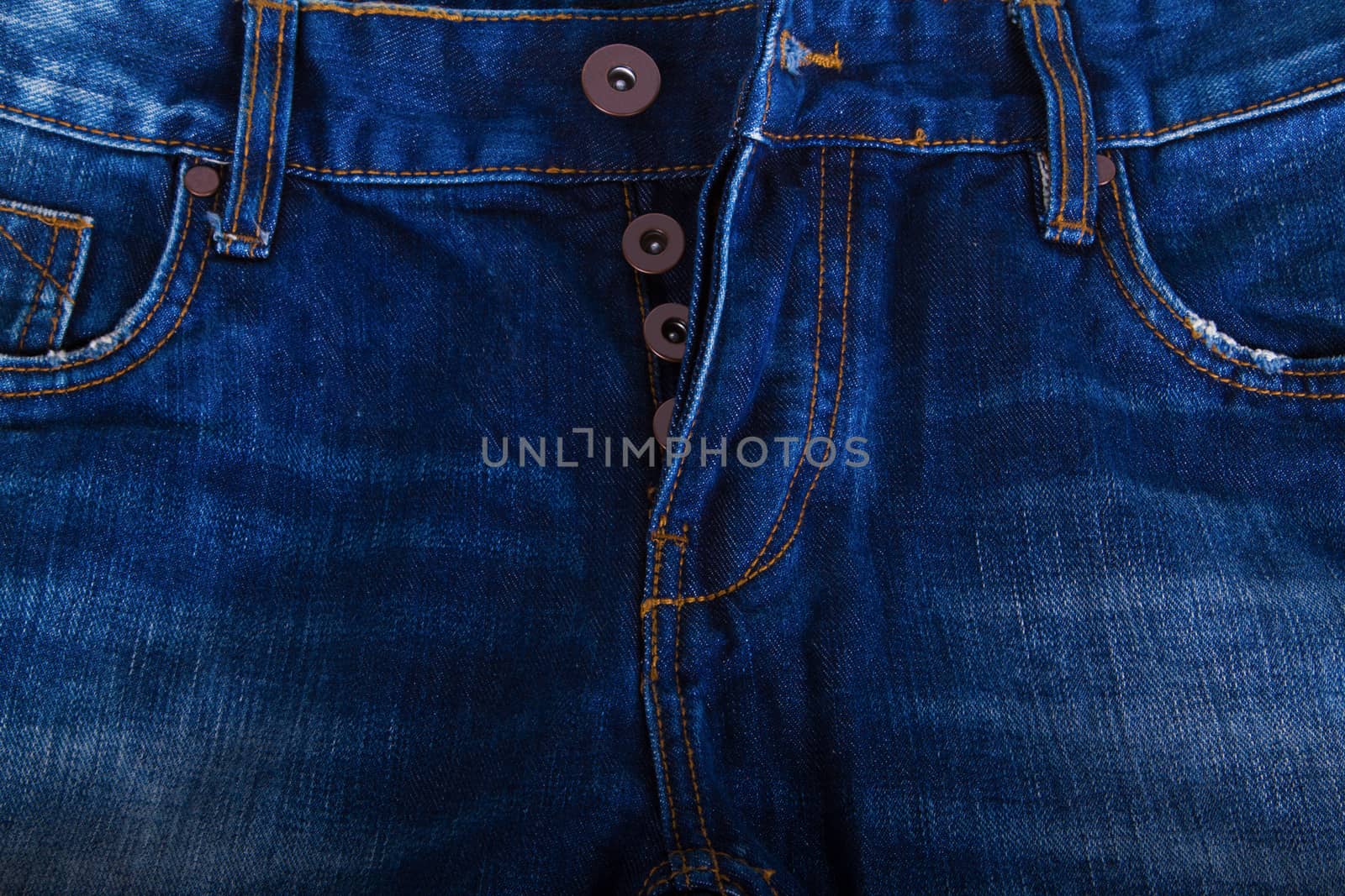 New blue jeans pocket in close up