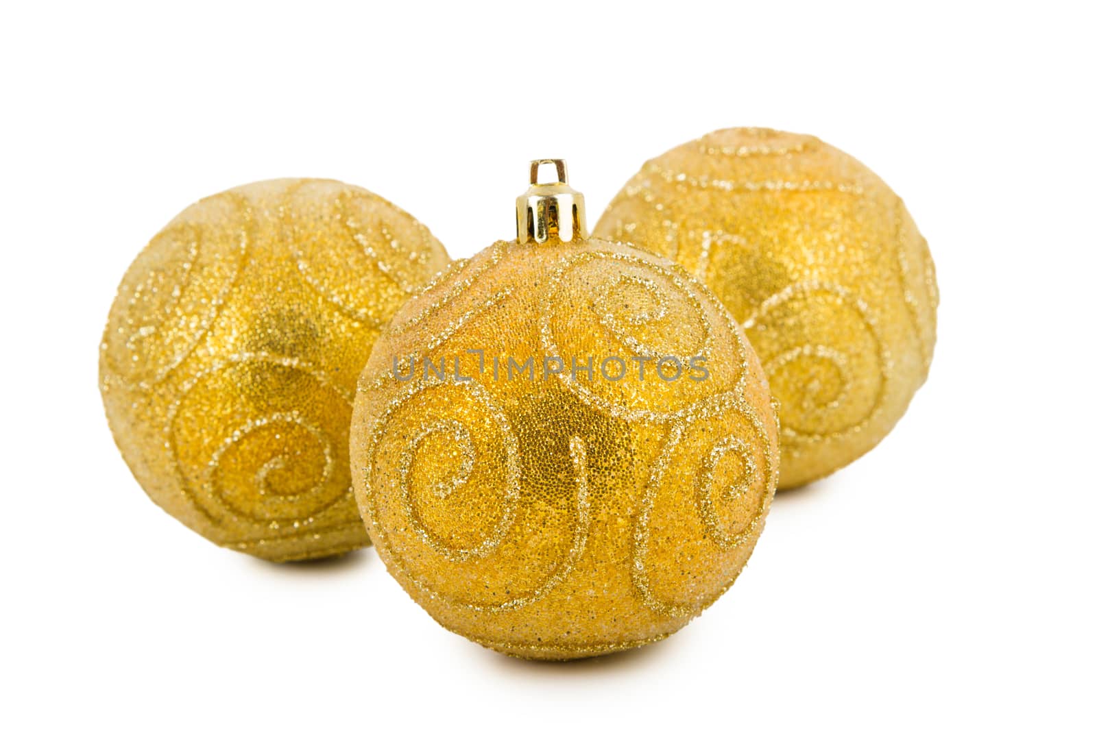 Gold Christmas balls isolated on a white background