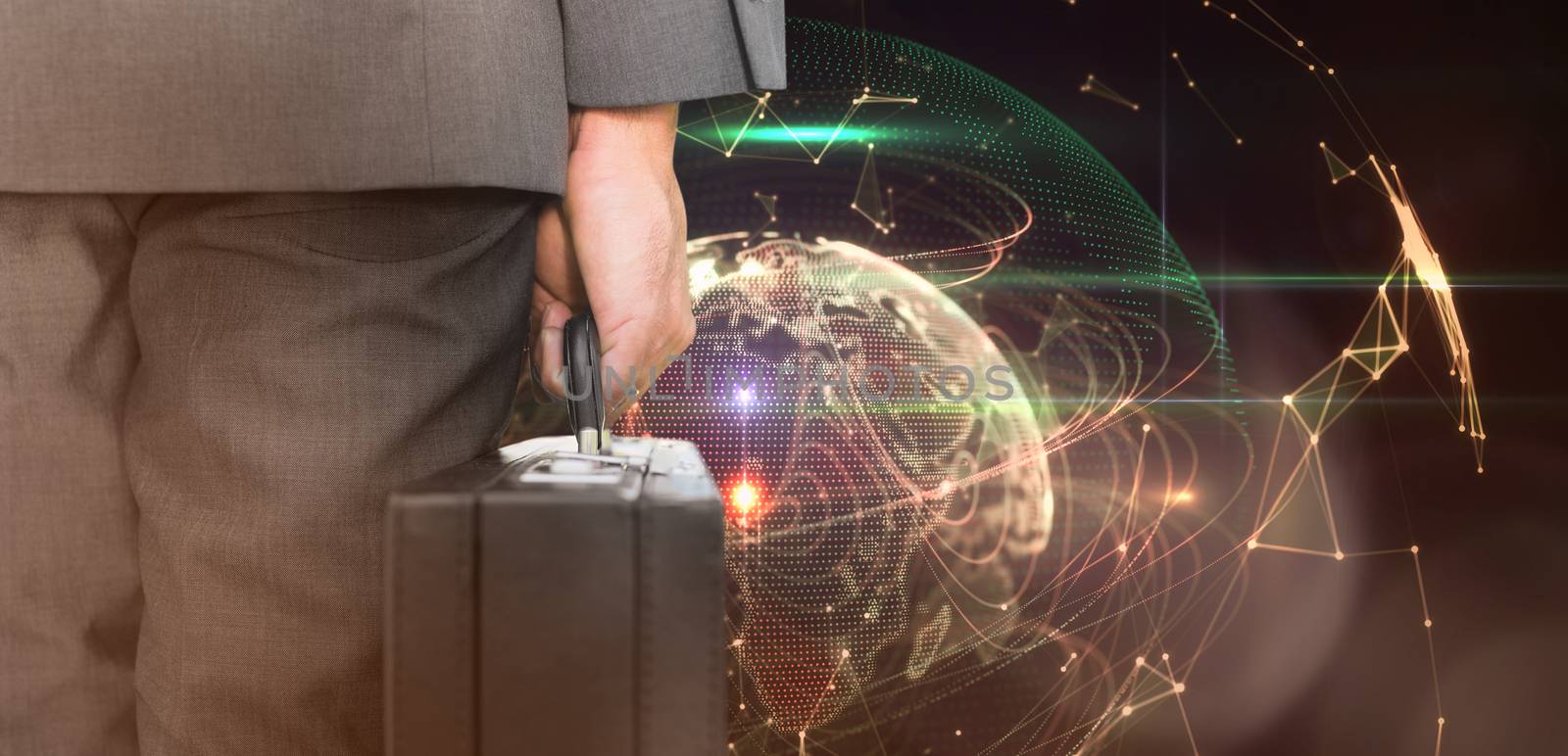 Composite image of businessman holding briefcase by Wavebreakmedia