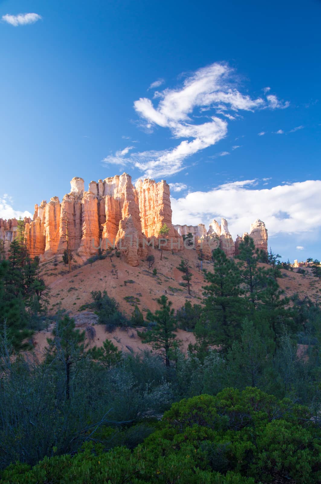 Bryce rock formations in late sunshine by emattil