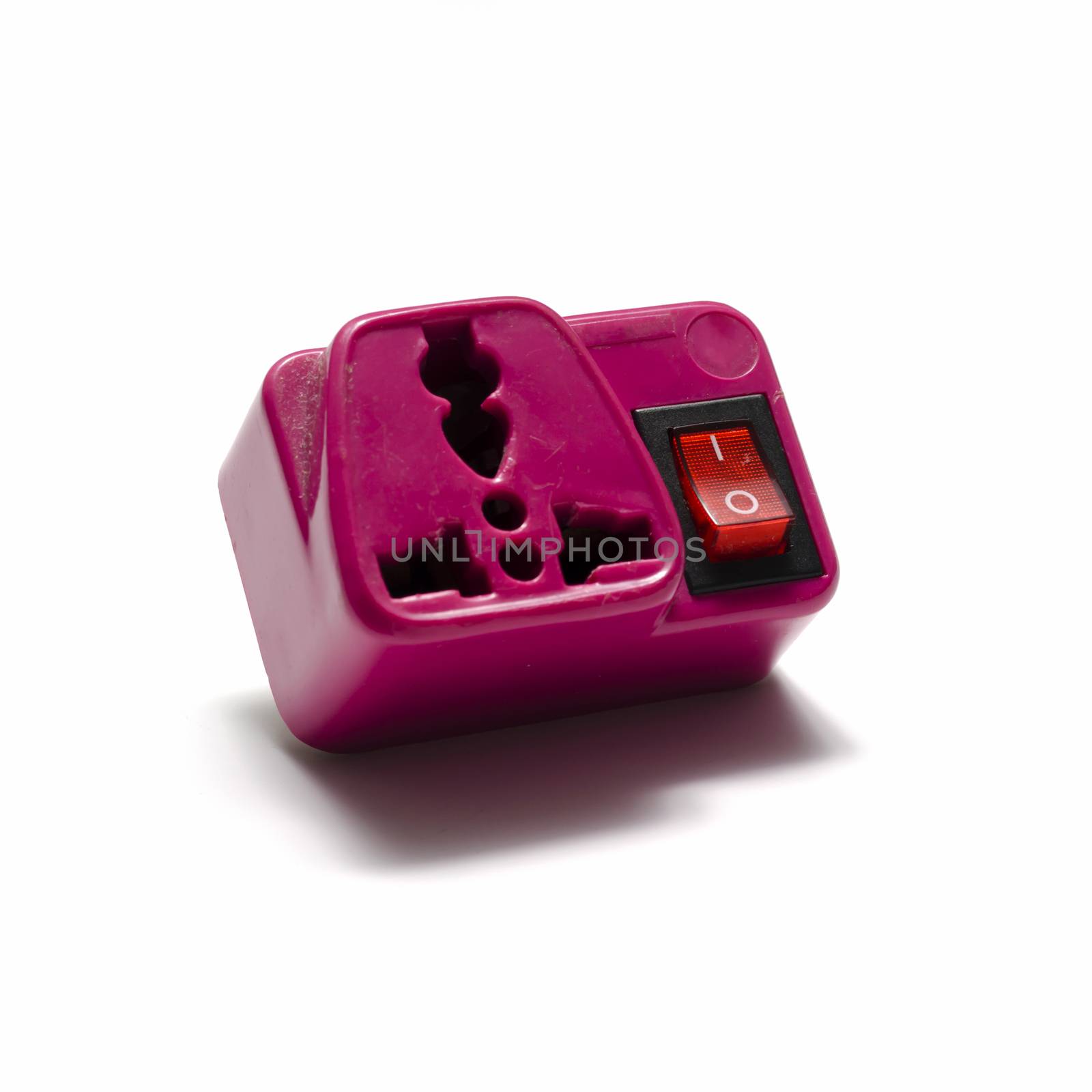 pink adapter plug on a white background