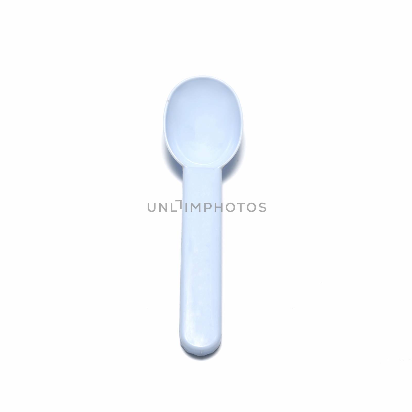 blue plastic spoon on a white background