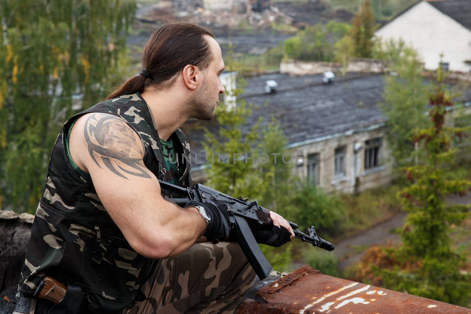 Army soldier with a gun