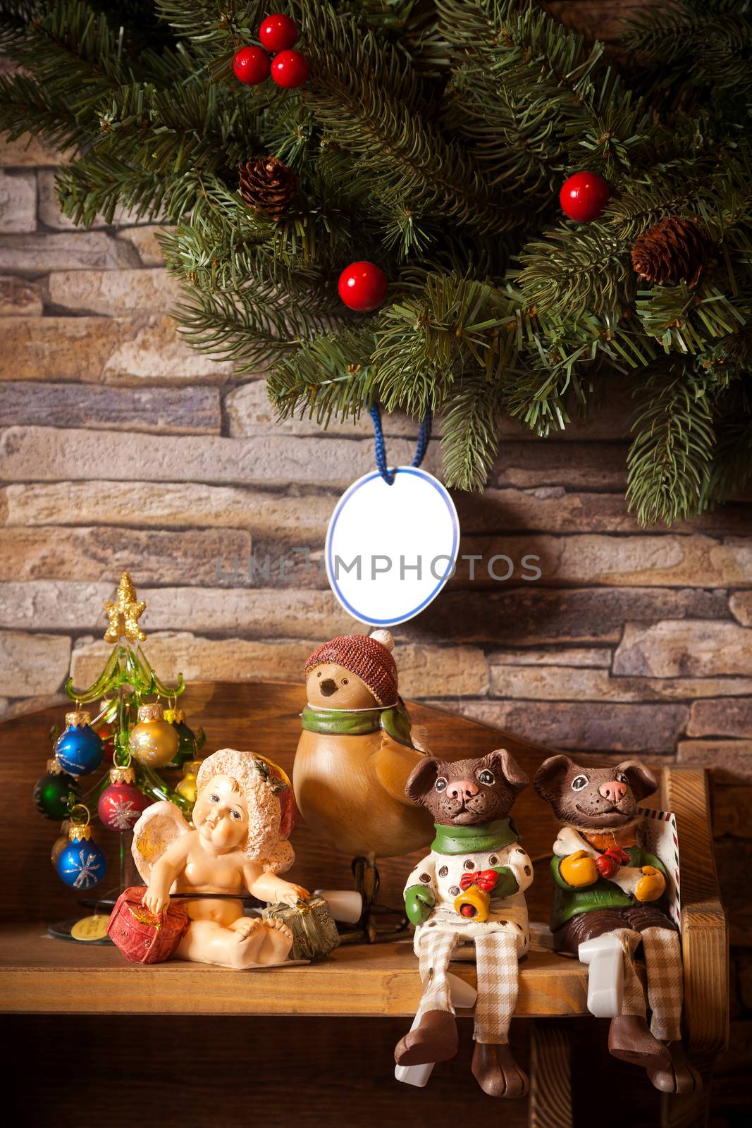 Some toy figures of animals on the wooden shelf