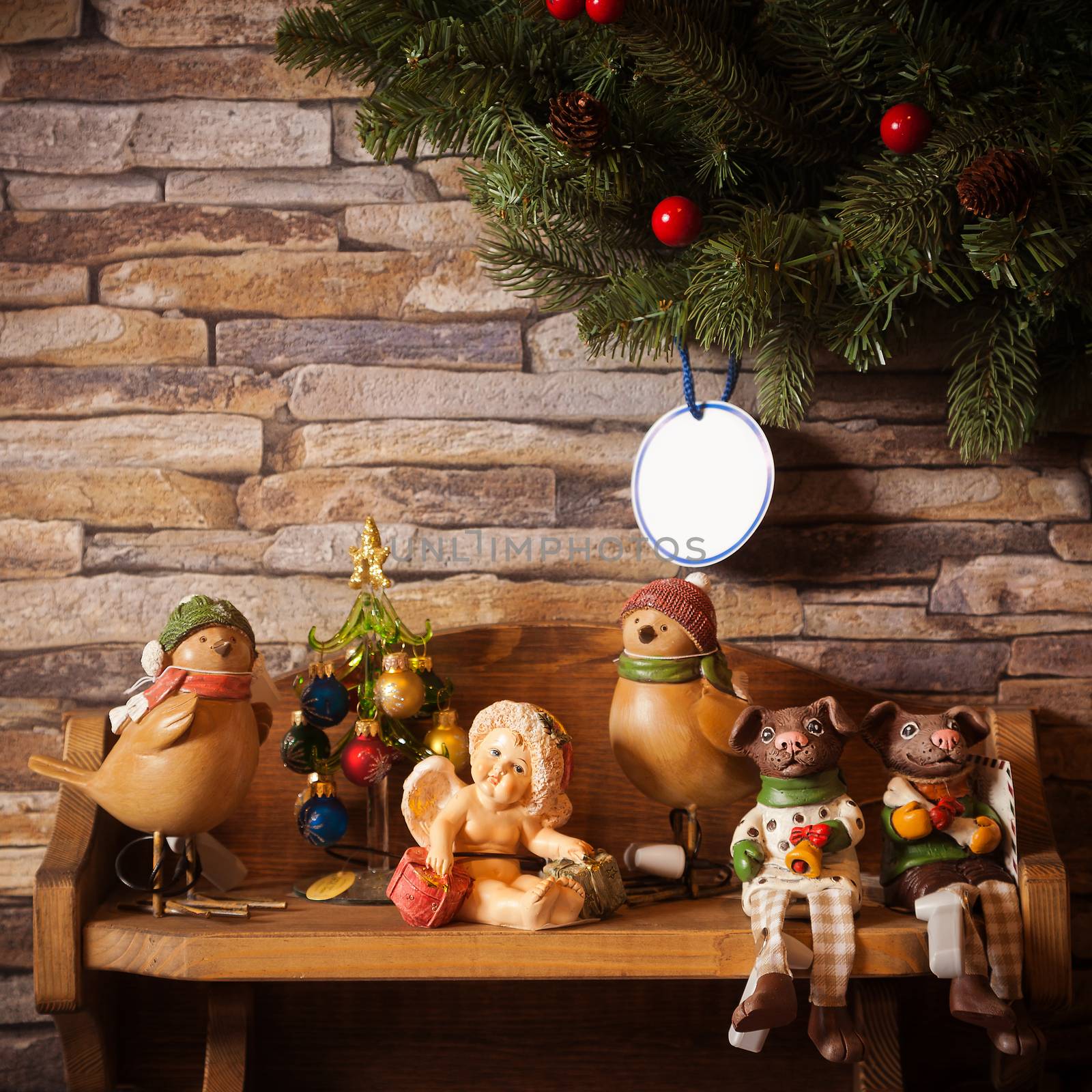 Some toy figures of animals on the wooden shelf