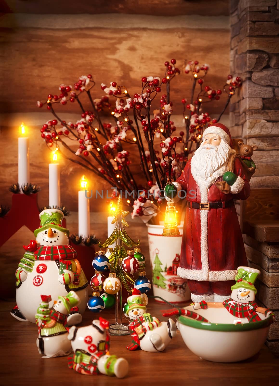 Figures of porcelain snowmen, Father Frost and a fir-tree with toys on the shelf