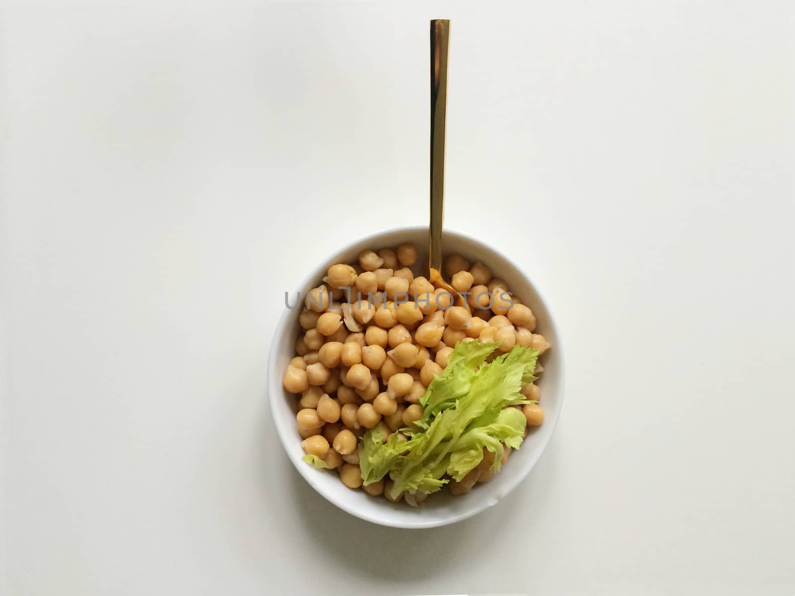 Salad of chickpeas and green celery stalks