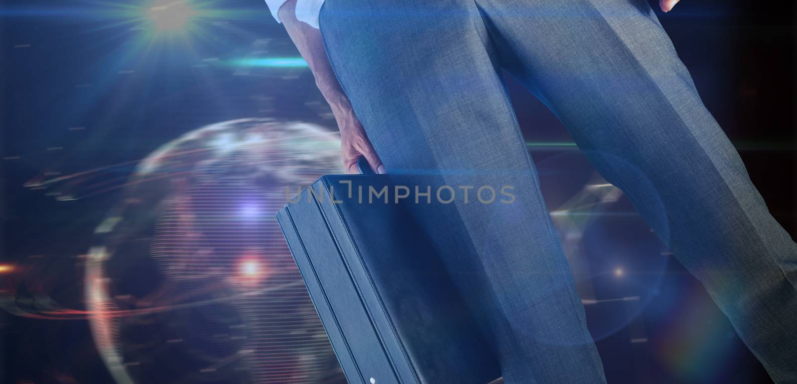 Composite image of businessman holding briefcase by Wavebreakmedia