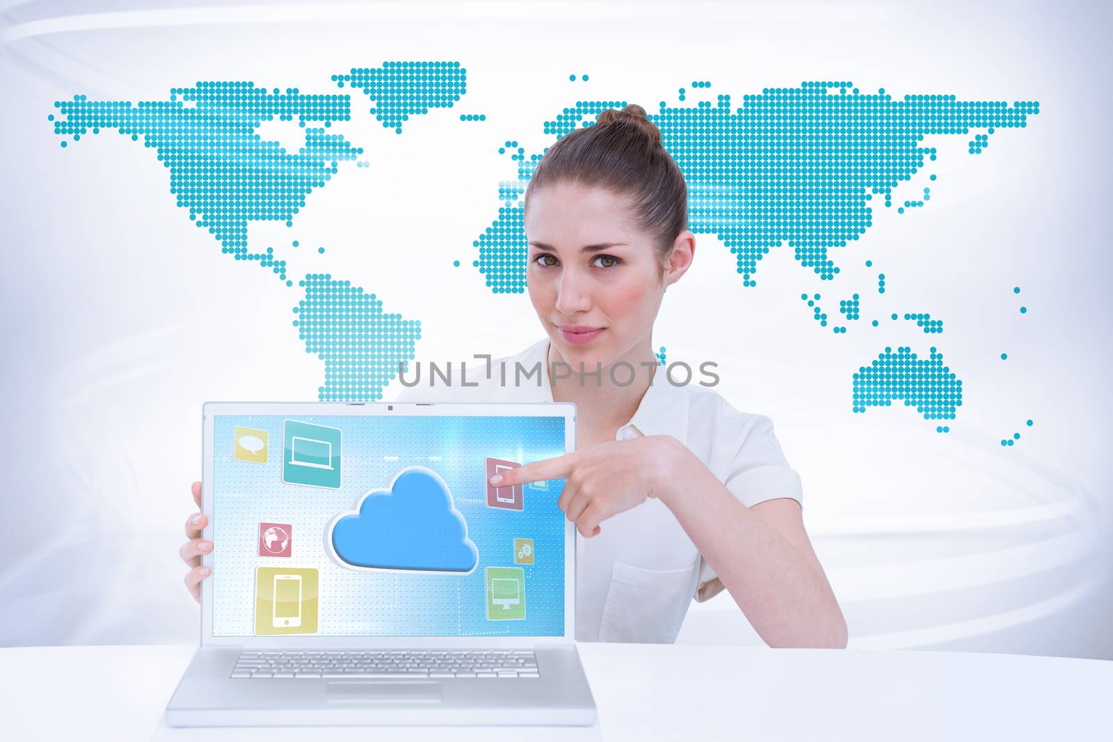 Composite image of businesswoman showing a laptop by Wavebreakmedia