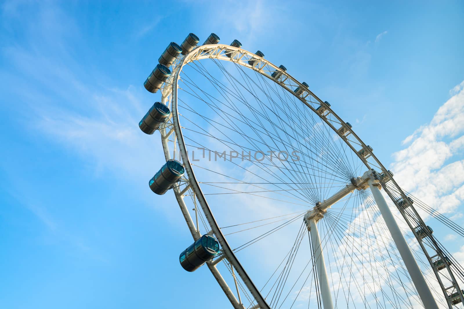Ferris wheel on blue sky by iryna_rasko