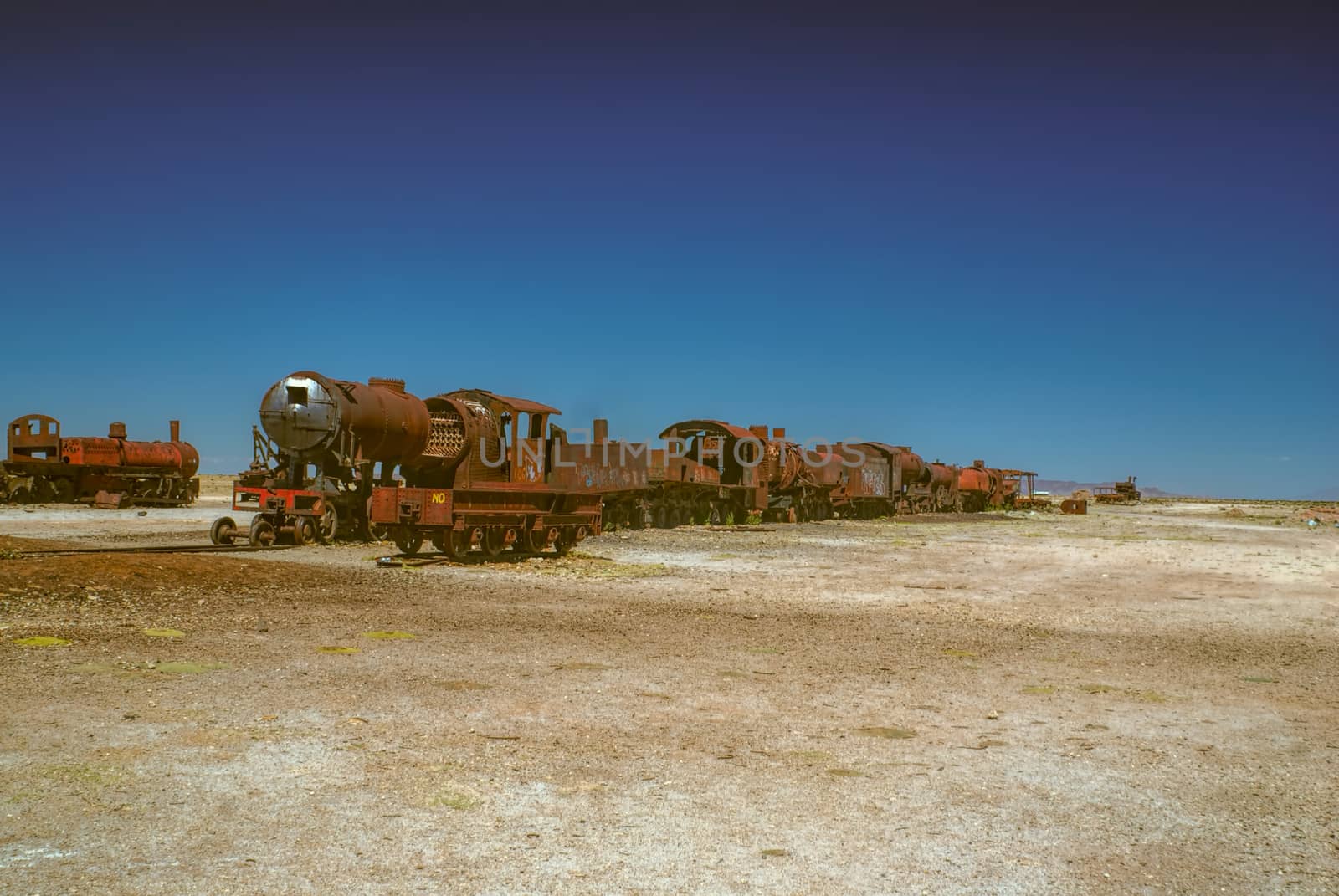 Old locomotive graveyard in desert near Salar de Uyuni in Bolivia          