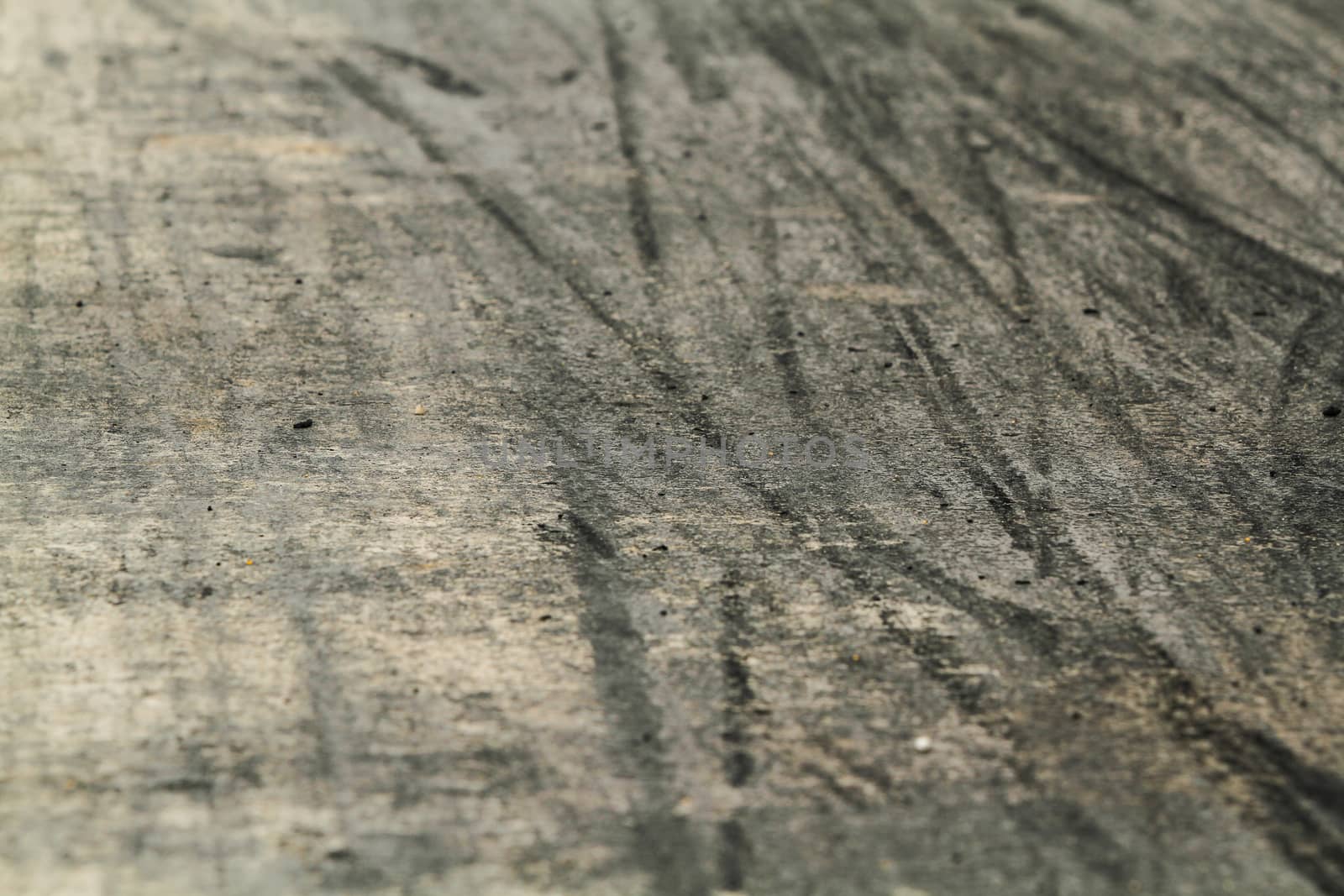 Background with tire marks on road track