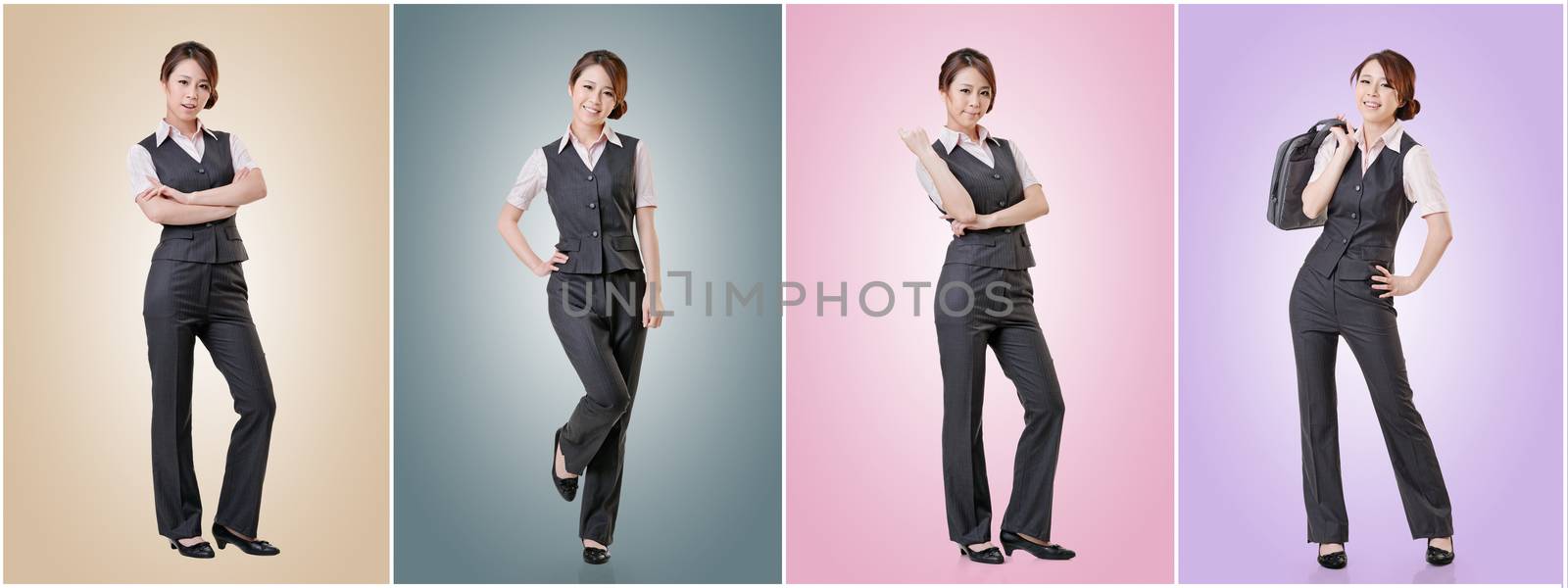 Asian business woman standing against studio background, full length portrait in a set.