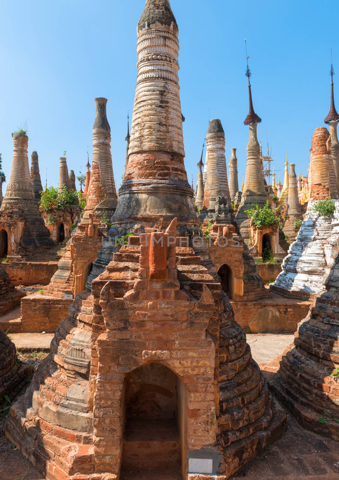 Ruins of ancient Burmese Buddhist pagodas in the village of Indein on Inlay Lake in Shan State, Myanmar (Burma).