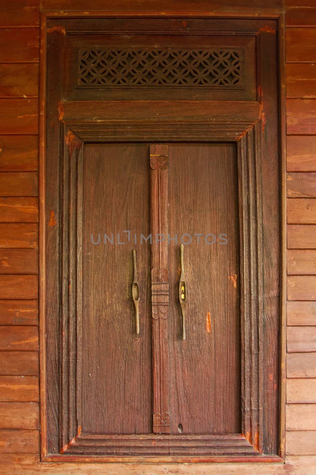 Old wooden door in Thailand design style