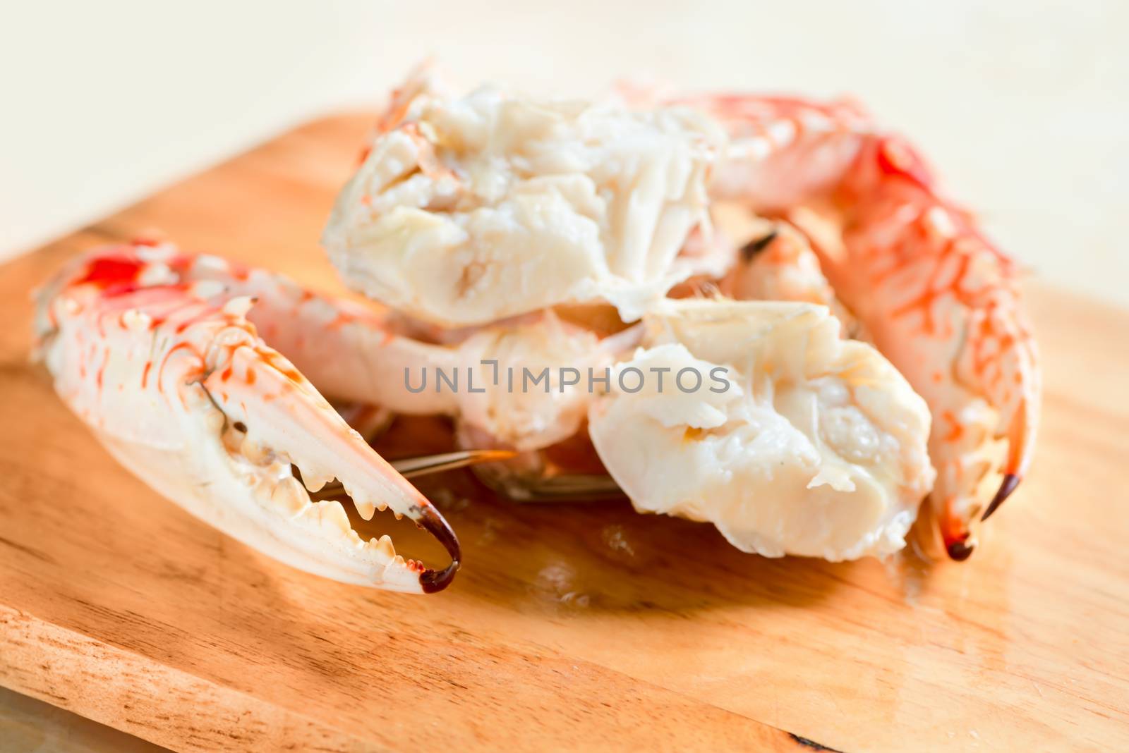  Fresh boiled and dressed crabs on wooden board