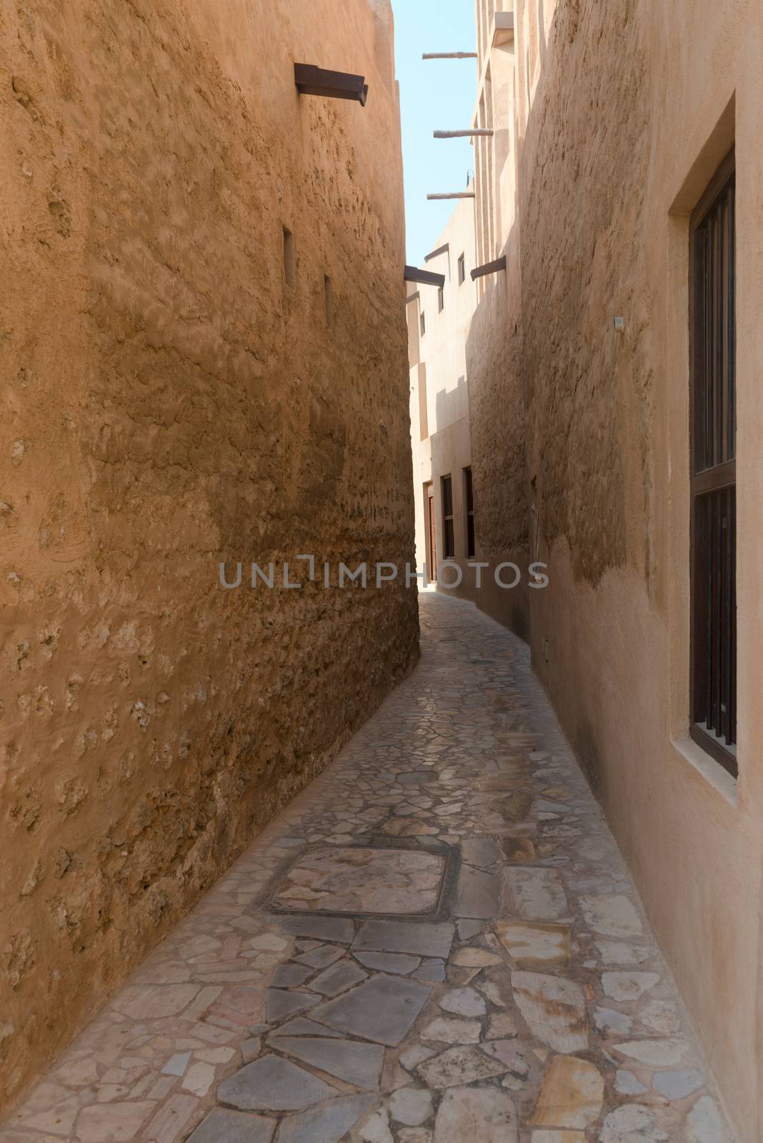 Tiny alleyways  in the old arabic merchant quarter of Bastakiya in Dubai, United Arab Emirates. 