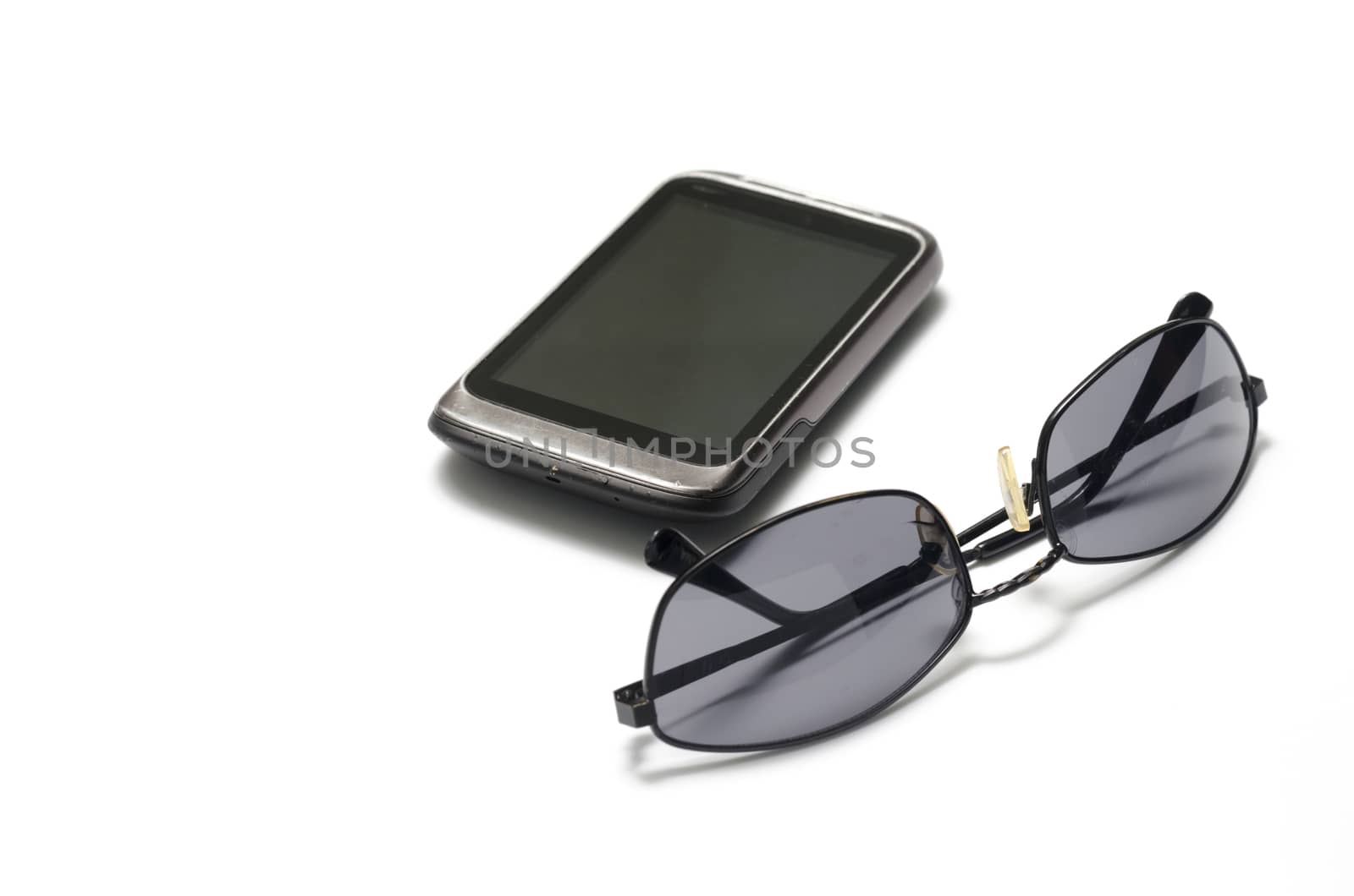 sunglasses with smart phone on a white background