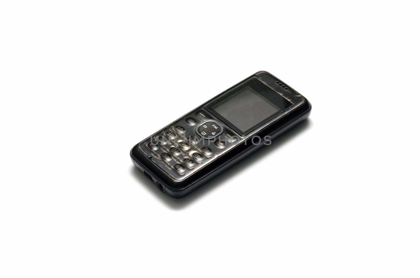 old mobile phone on a white background