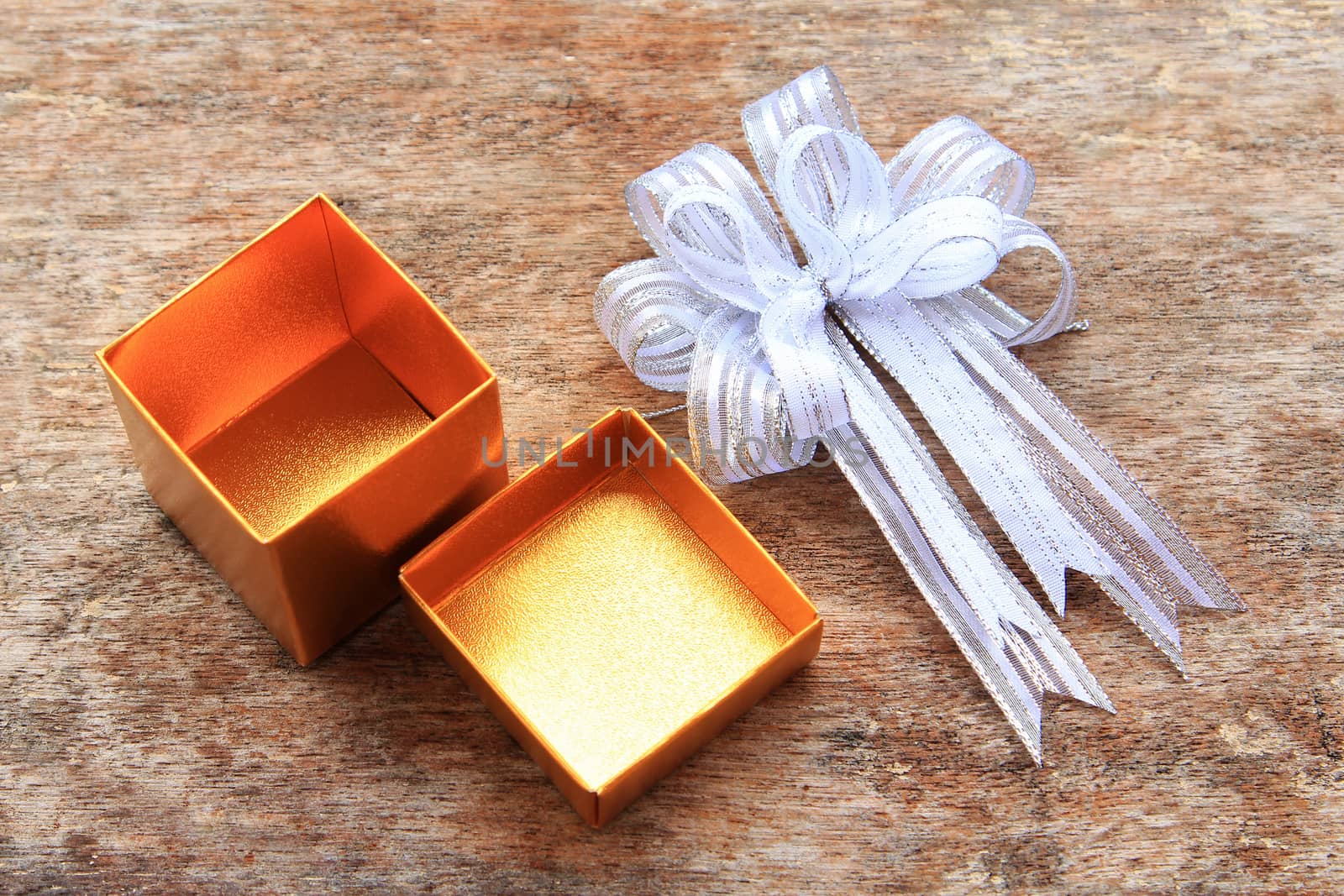 White Ribbon and Golden Gift Box by foto76