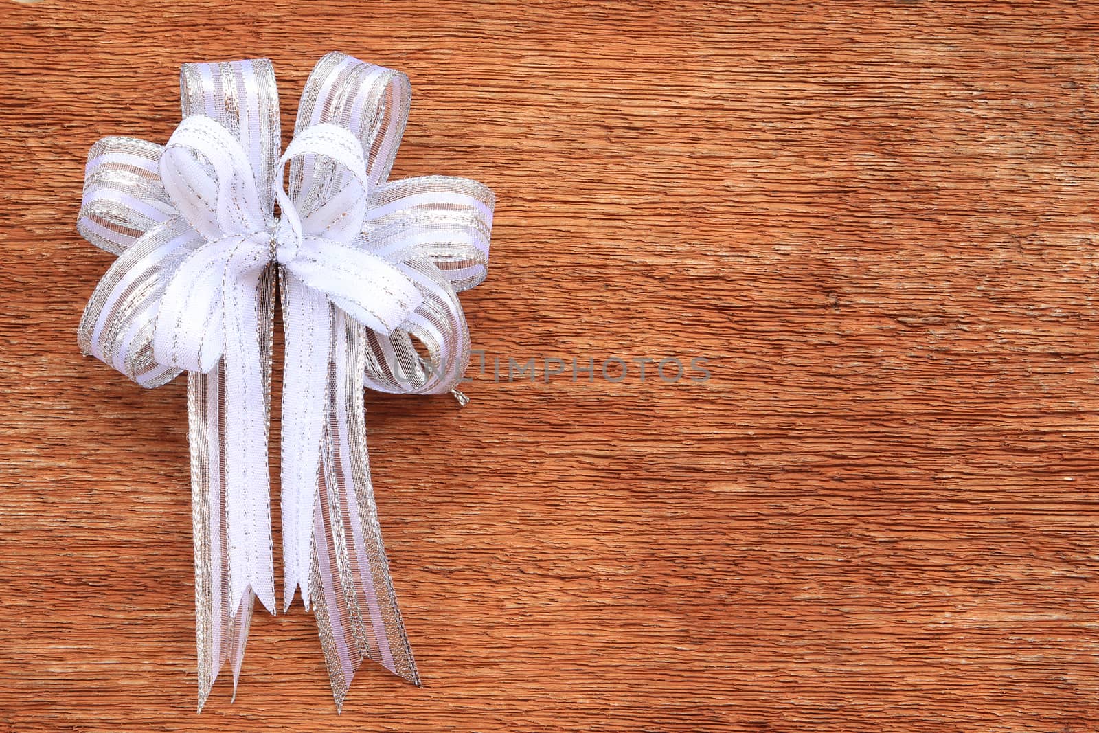 White Bow on Old Wood Background by foto76