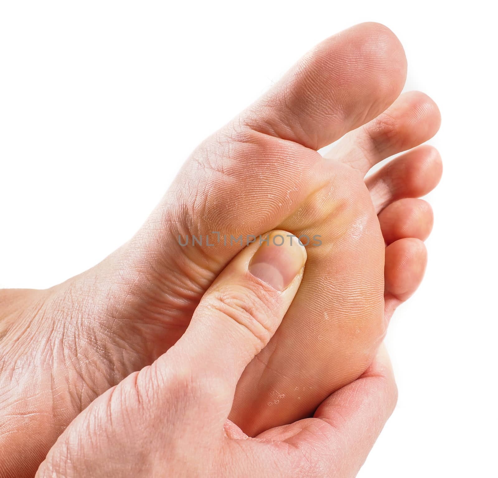 Male person receiving podiatry with pressure point technique under foot isolated towards white