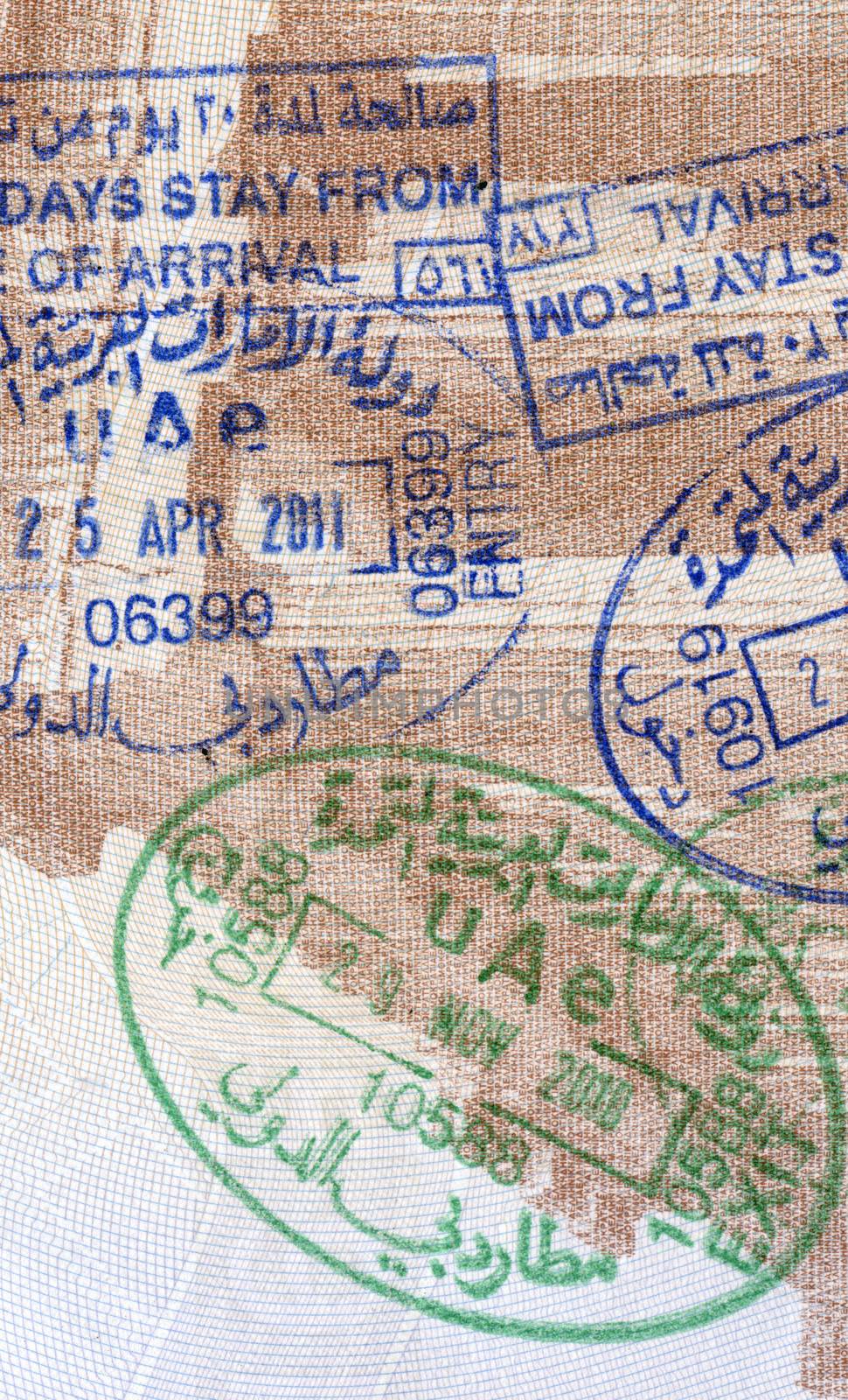 Background of passport stamps closeup by Portokalis