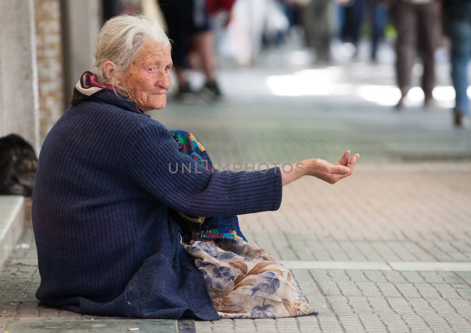 THESSALONIKI, GREECE - JUNE 28: The number of beggars in the city has increased dramatically. The economic crisis has hit the elderly on June 28, 2011 in Thessaloniki, Greece