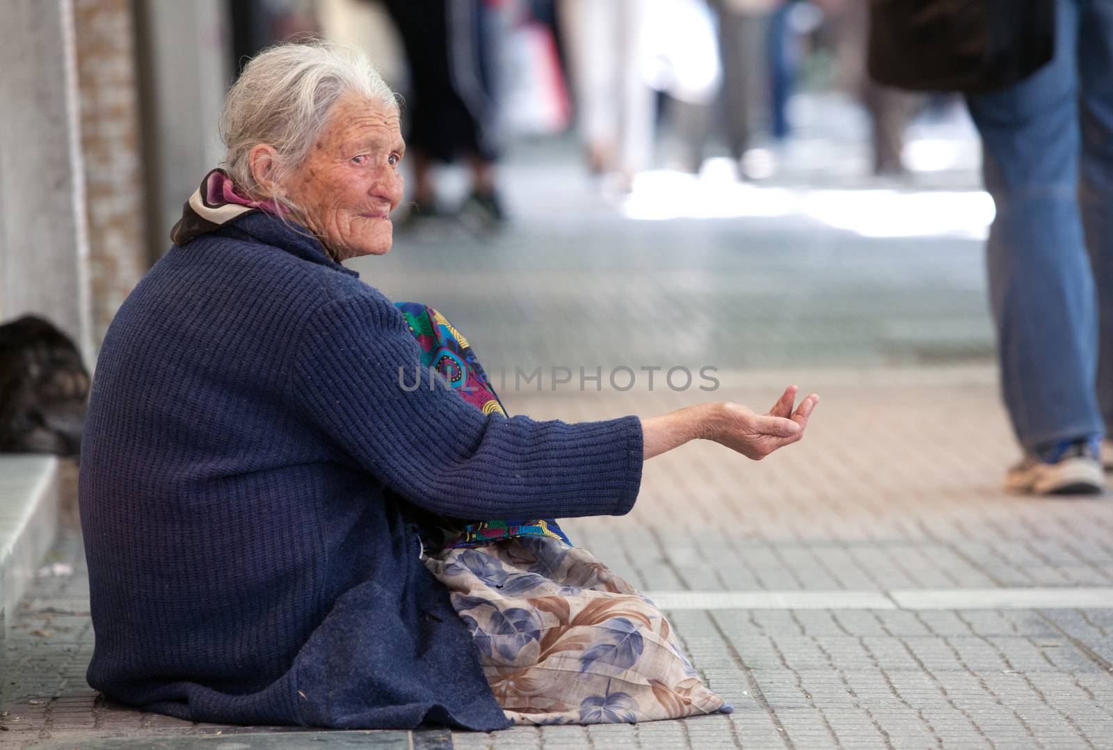 THESSALONIKI, GREECE - JUNE 28: The number of beggars in the city has increased dramatically. The economic crisis has hit the elderly on June 28, 2011 in Thessaloniki, Greece