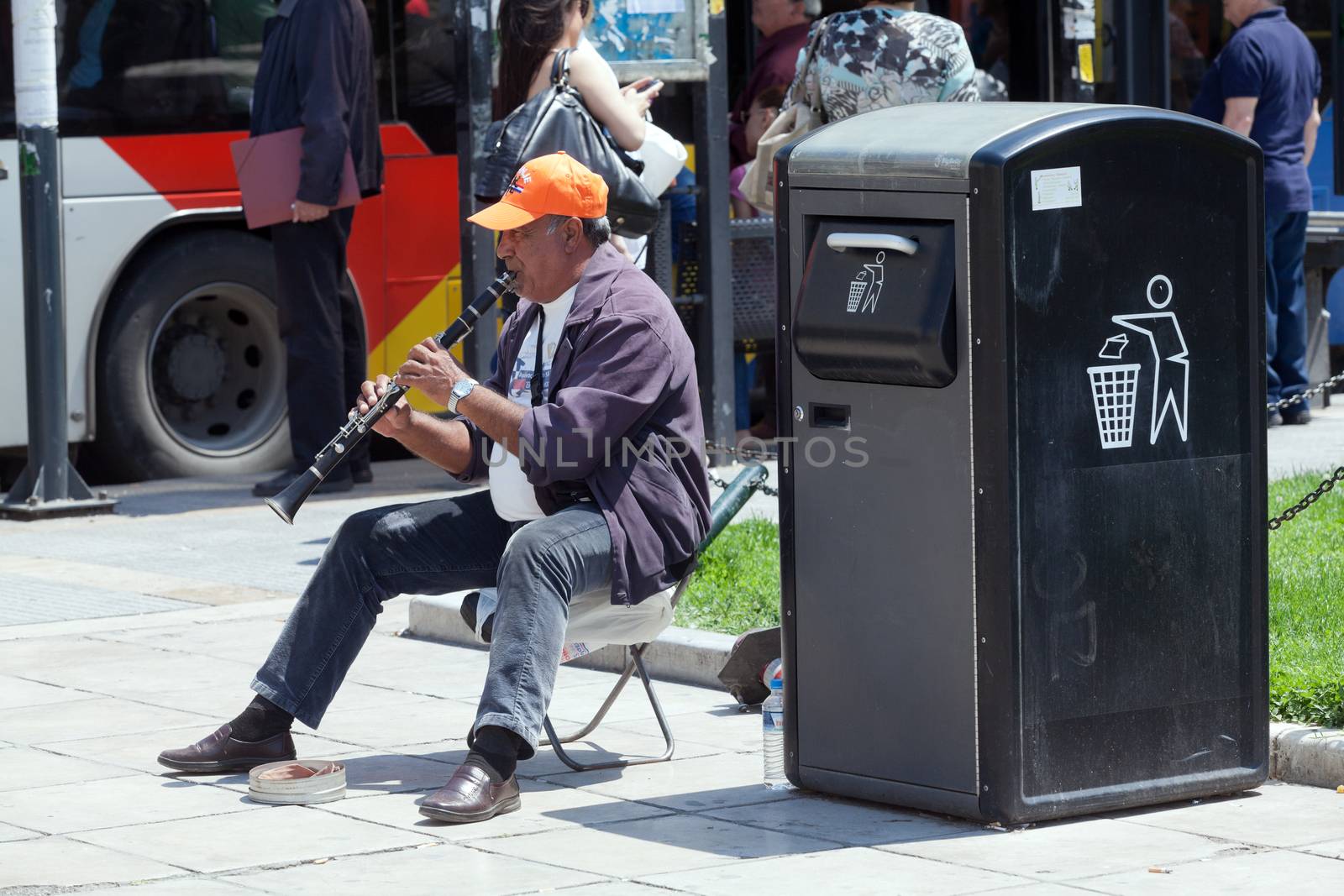 THESSALONIKI, GREECE - JUNE 28: The number of street musicians in the city has increased dramatically. The economic crisis has hit the elderly on June 28, 2011 in Thessaloniki, Greece