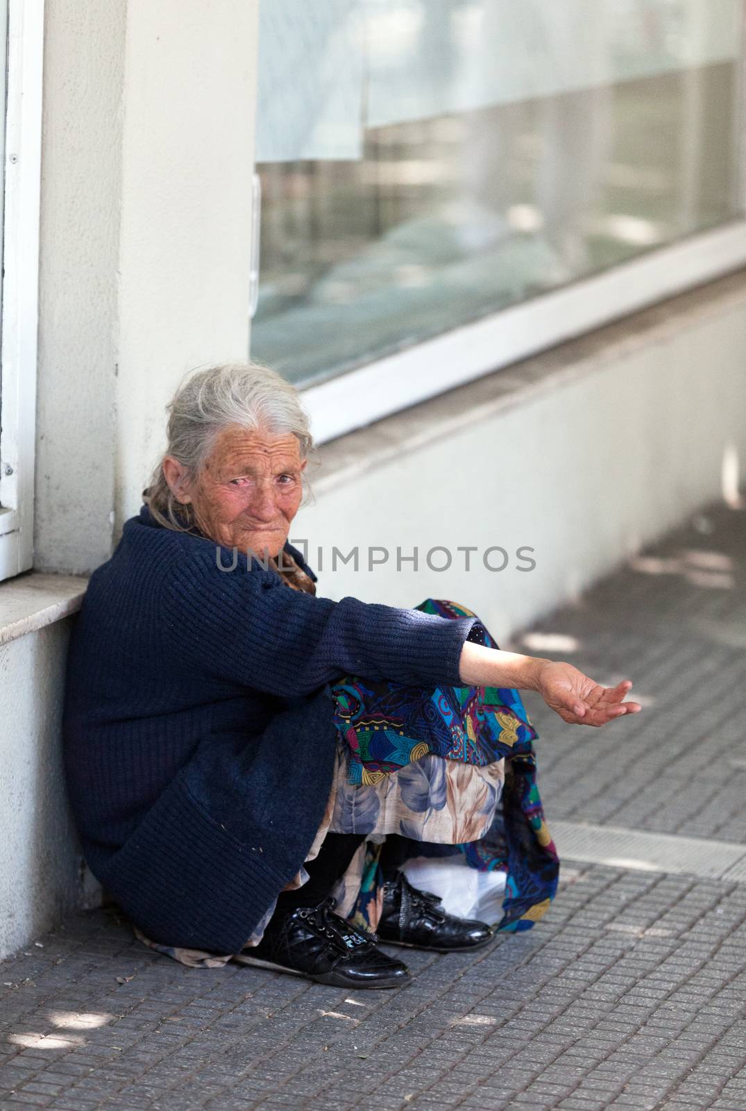 THESSALONIKI, GREECE - JUNE 28: The number of beggars in the city has increased dramatically. The economic crisis has hit the elderly on June 28, 2011 in Thessaloniki, Greece
