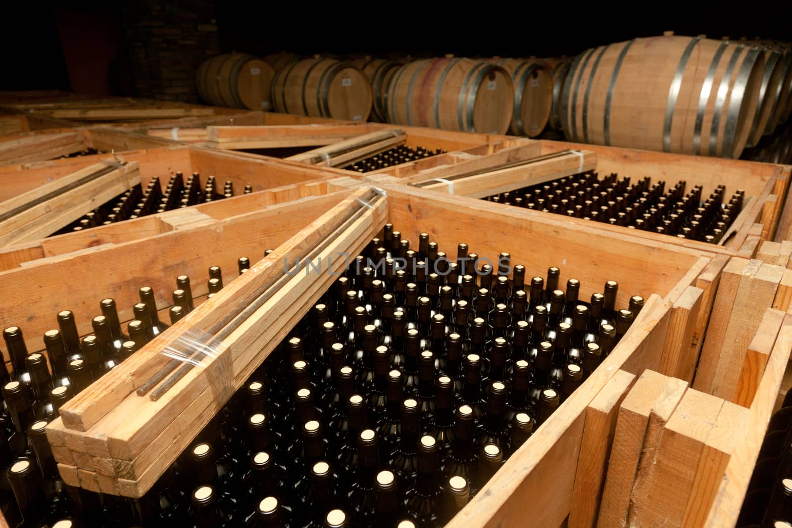 Packaged bottles of wine in large wooden crates