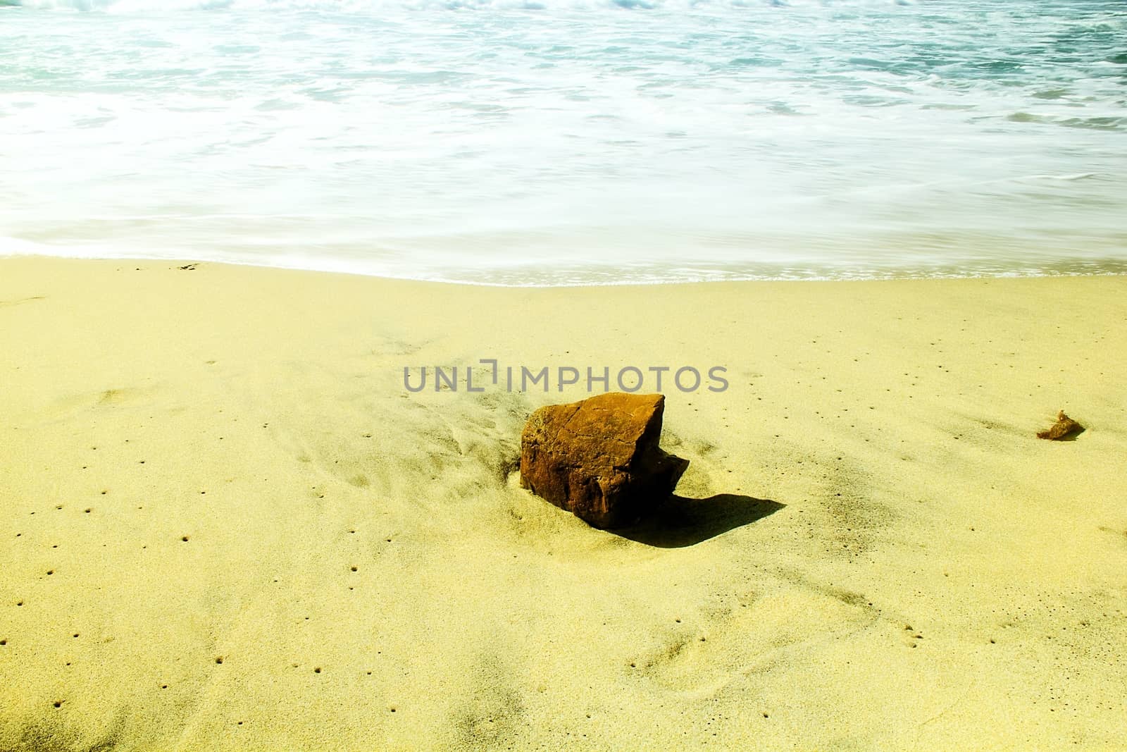 Red rock on the beach.