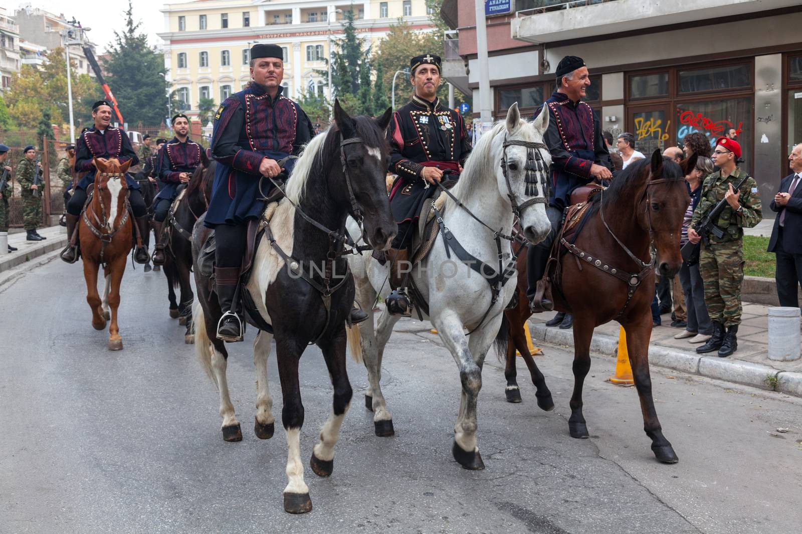 THESSALONIKI, GREECE - OCT 27:100th liberation anniversary from the City's 500 years Ottoman Empire Occupation; flown of the Greek flag on the White Tower on Oct 27, 2012 in Thessaloniki, Greece