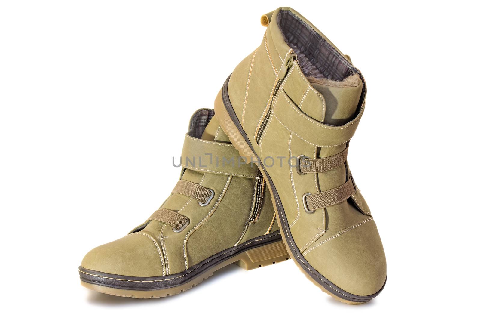Comfortable and warm winter suede boots for women. Presented on a white background.