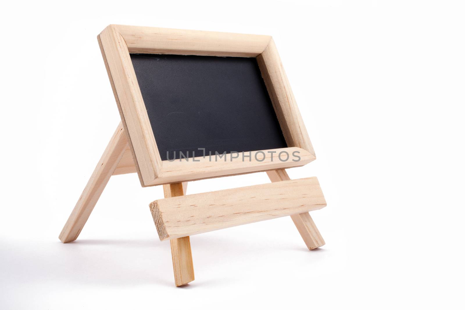 Small blackboard on easel with large space for your copy text (announcement, offer, menu)