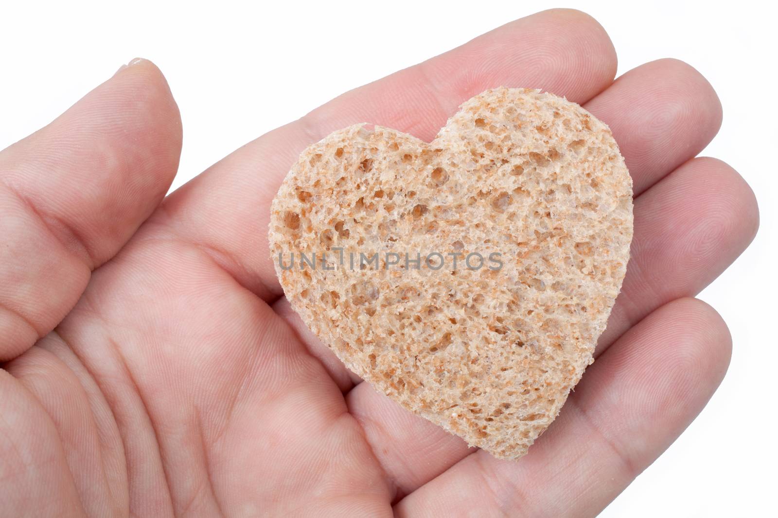 A piece of bread offered with love - isolated on white by Portokalis