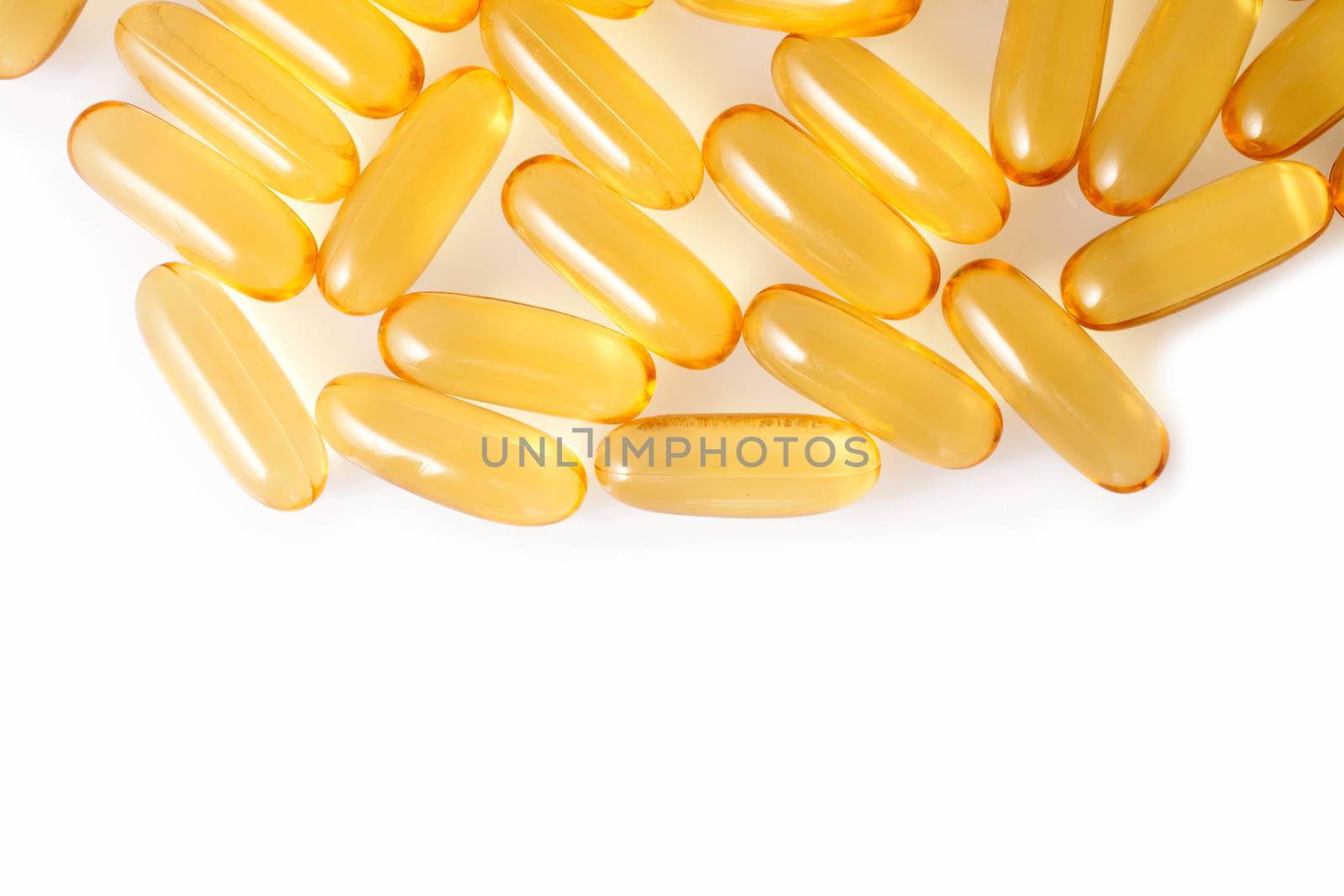 Oil vitamins capsule shapes on white background