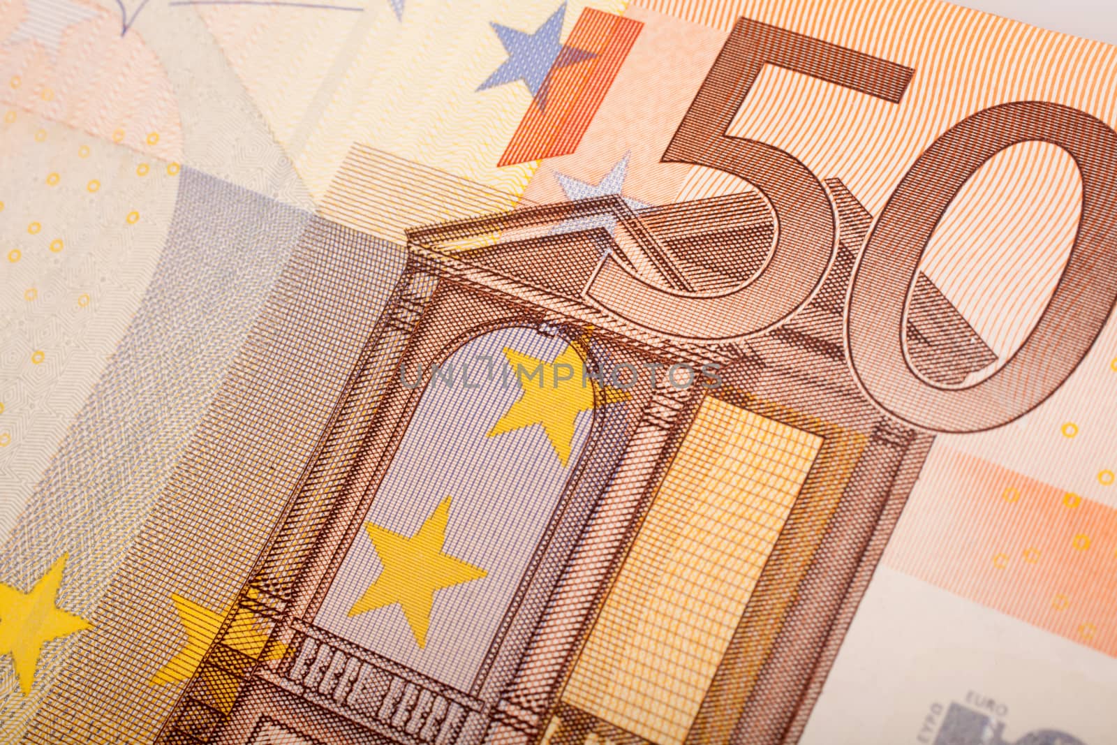 Detail of 50 euro banknotes on white background