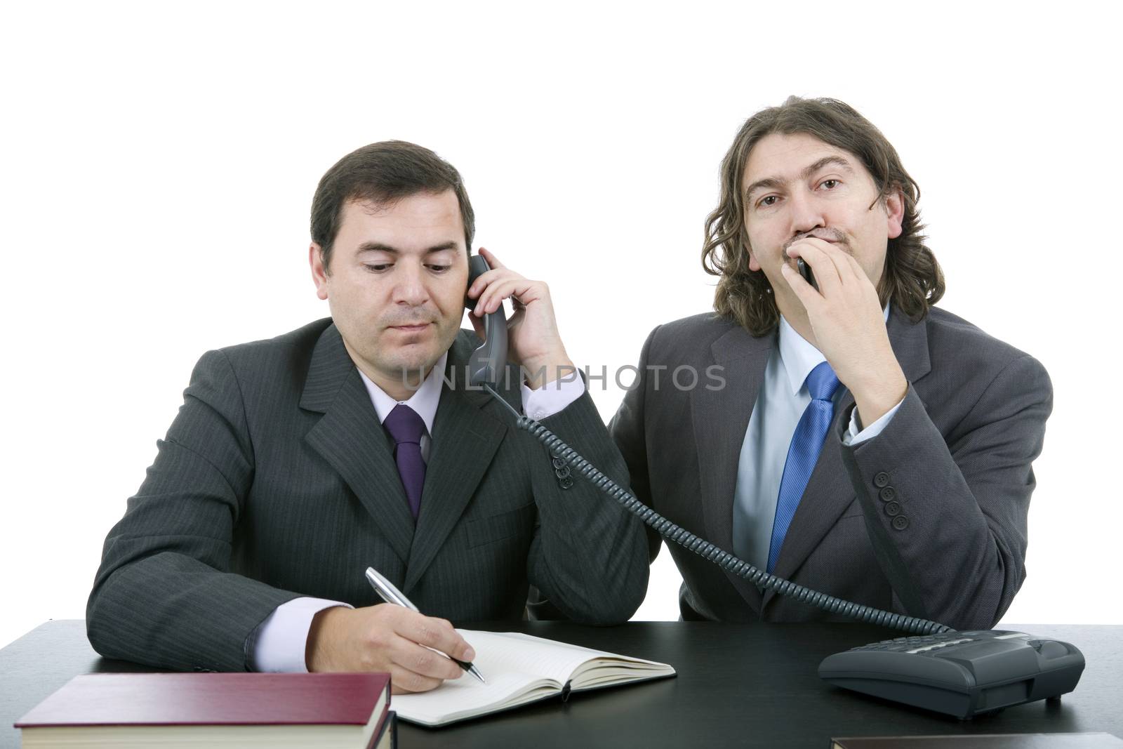 business team working at a desk, isolated on white