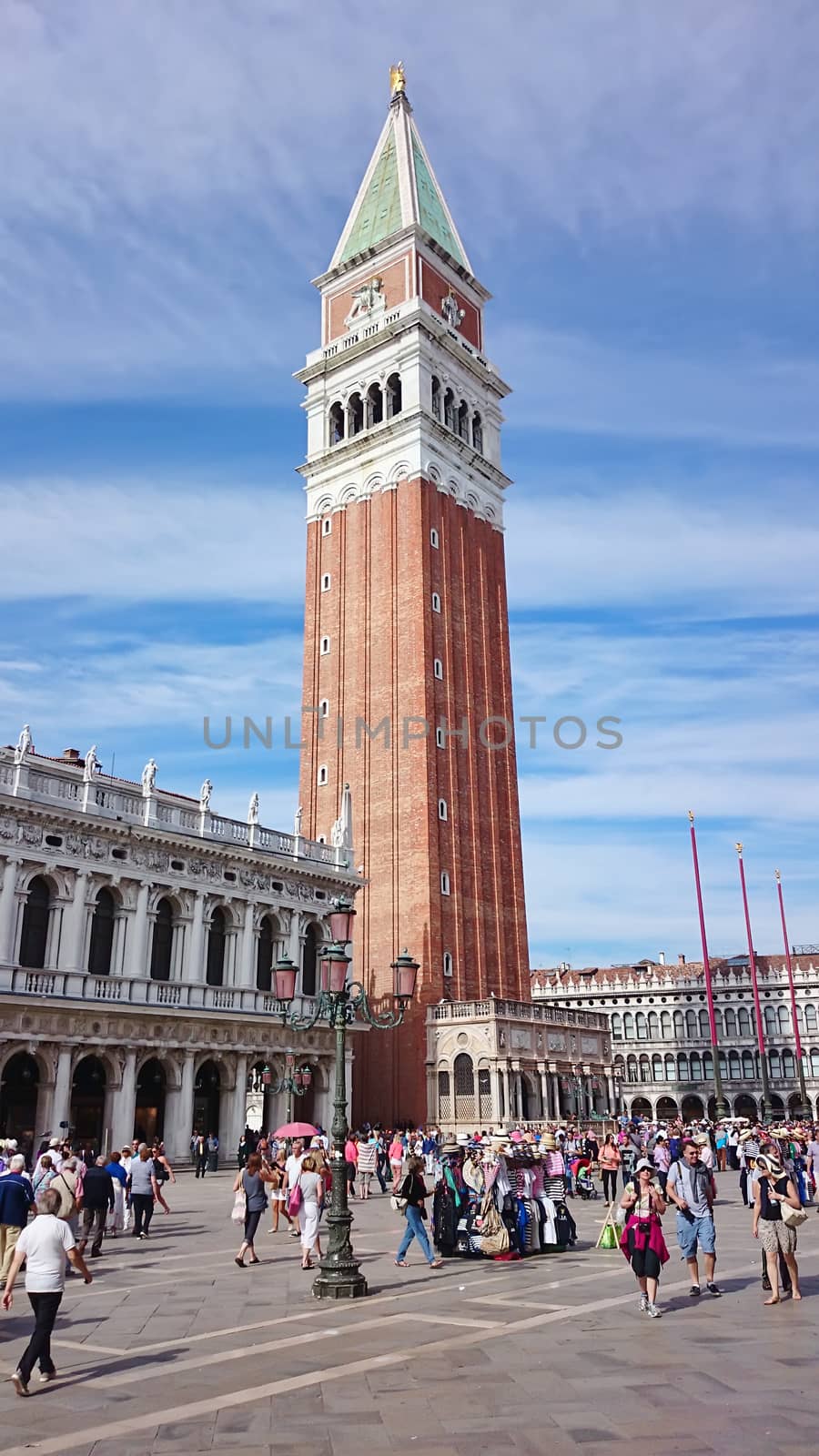 VENICE, ITALY - SEPTEMBER 26: Campanile or bell tower of St Mark's church and the Logetta at its foot in Piazza San Μarco or St Mar's Square on September 26, 2014 in Venice, Italy.