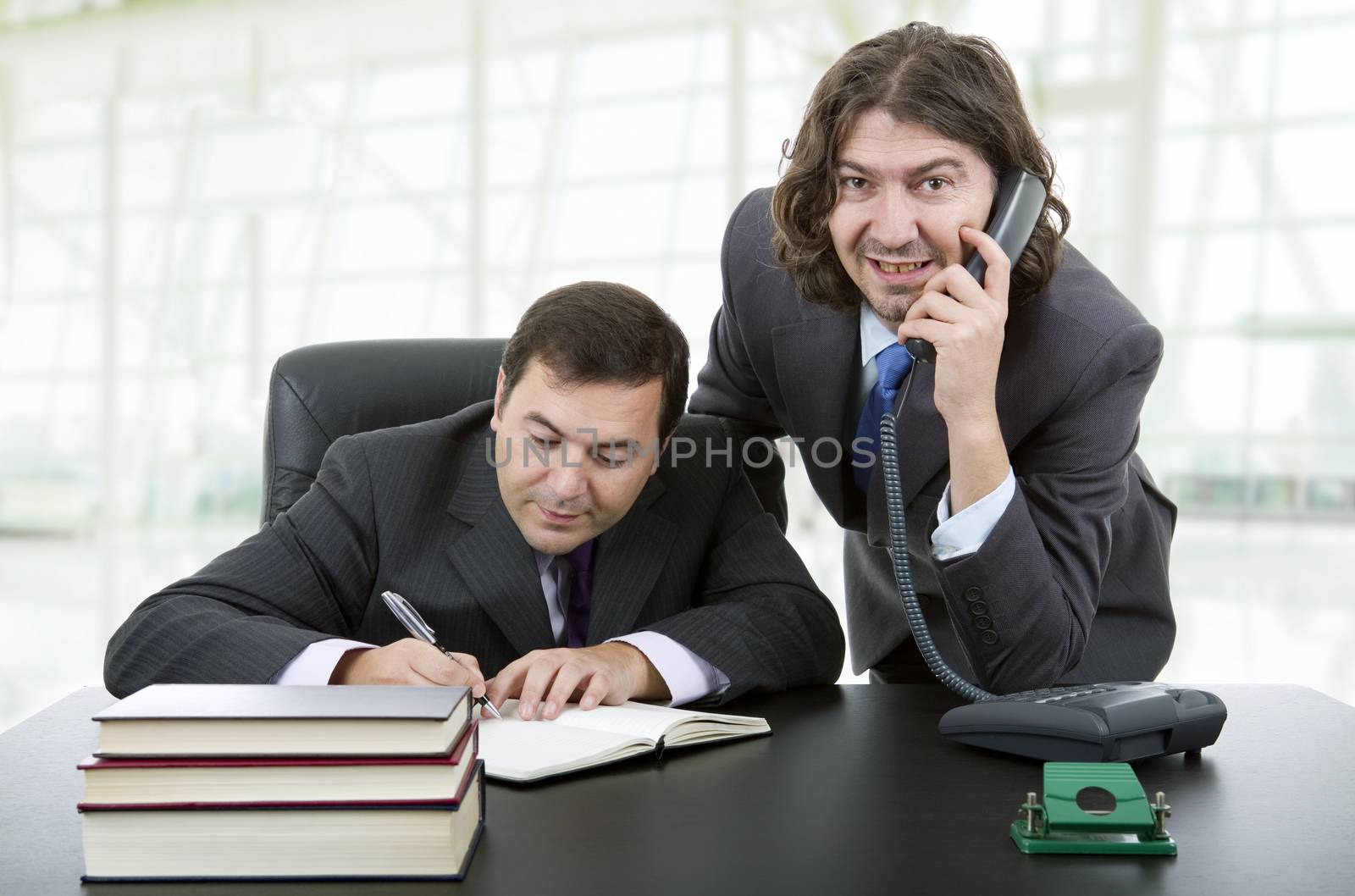 business team working at a desk at the office