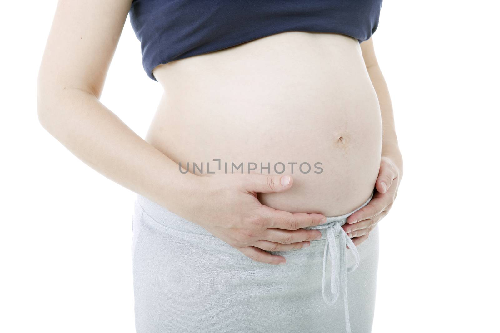 Closeup of pregnant woman at white background