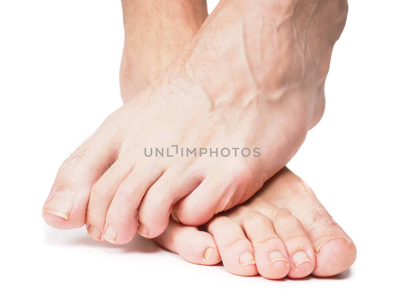 Male feet one over the other by Arvebettum