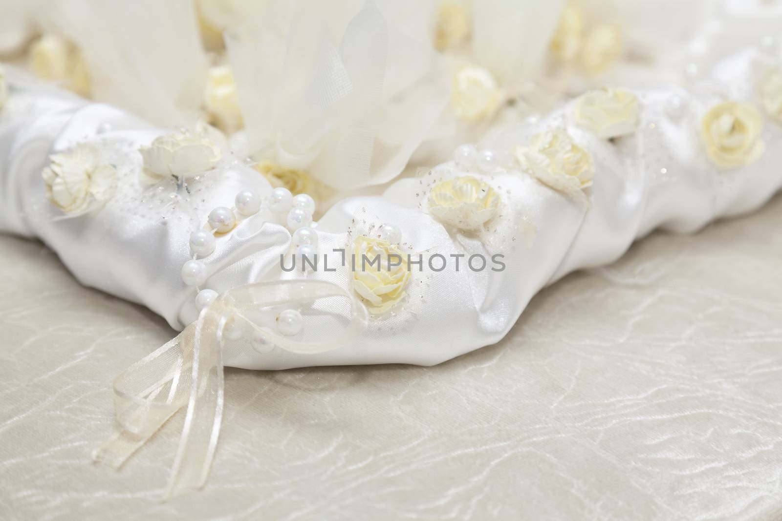 Elegant Wedding Favors decorated with artificial flowers