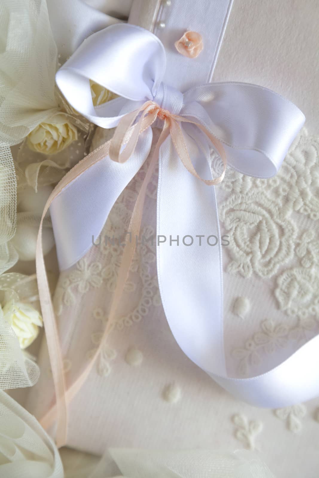 Wedding Book of Wishes decorated with ribbons and dried flowers