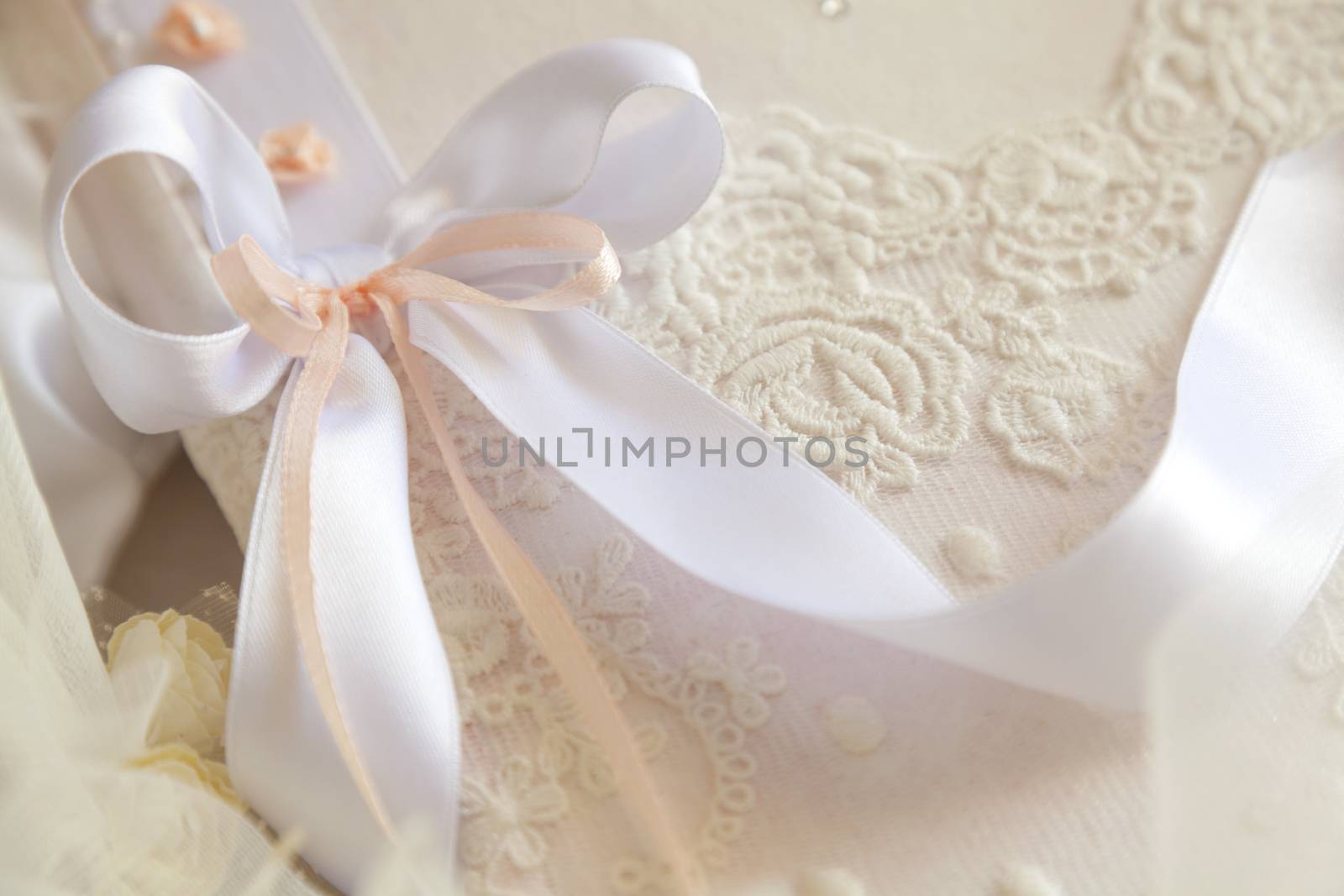 Wedding Book of Wishes decorated with ribbons and dried flowers